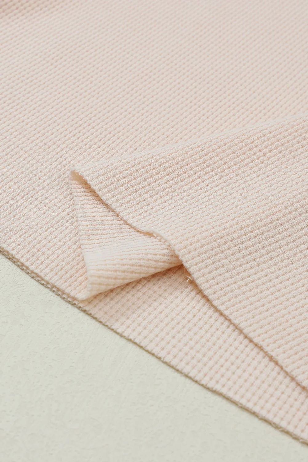 Haut Henley texturé en tricot gaufré beige