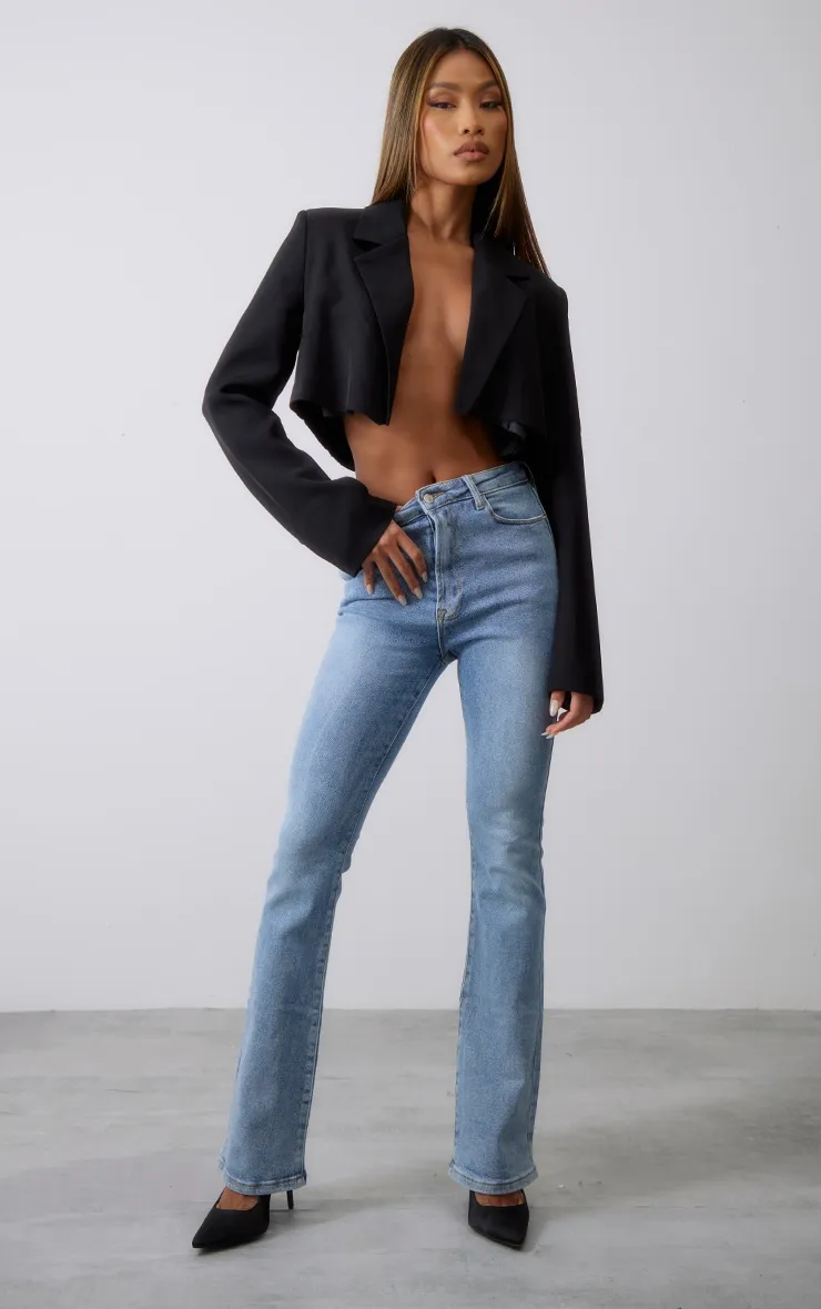 Jean slim évasé en Lycoell stretch bleu délavé vintage à taille mi-haute